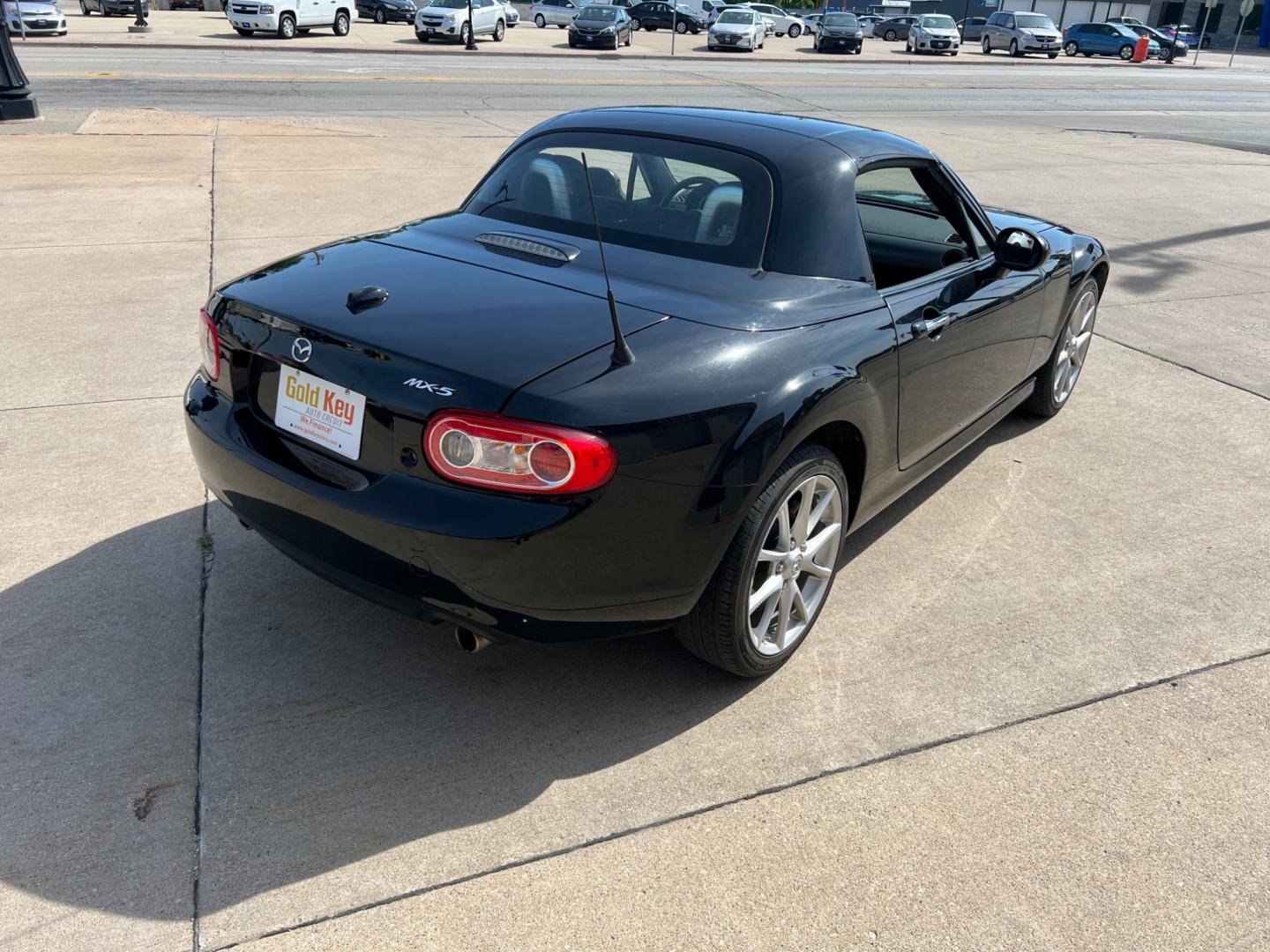 2012 Brilliant Black with Brilliant Black Hard Top /Black Leather Interior Mazda MX-5 Miata Grand Touring PRHT (JM1NC2PF6C0) with an 2.0L L4 DOHC 16V engine, 6-Speed Automatic transmission, located at 104 1st Avenue, Silvis, IL, 61282, (309) 755-9511, 41.515156, -90.425377 - Photo#6